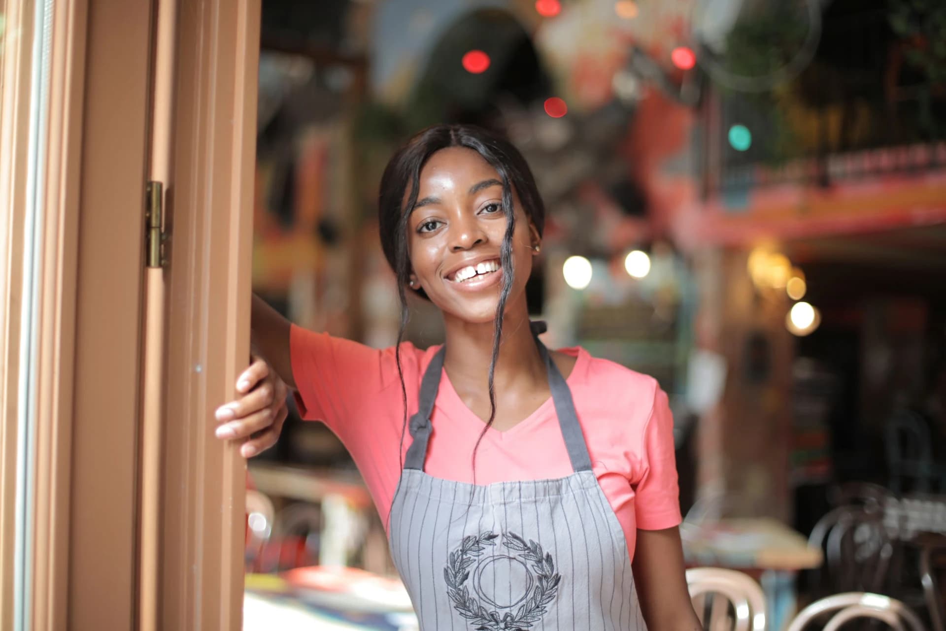 A young restaurant worker ready for a shift